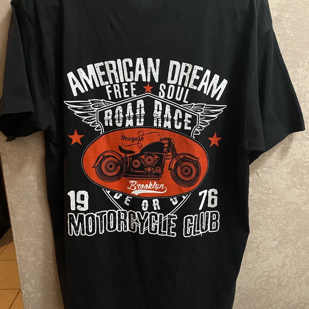 Brand New black shirt with design on the back